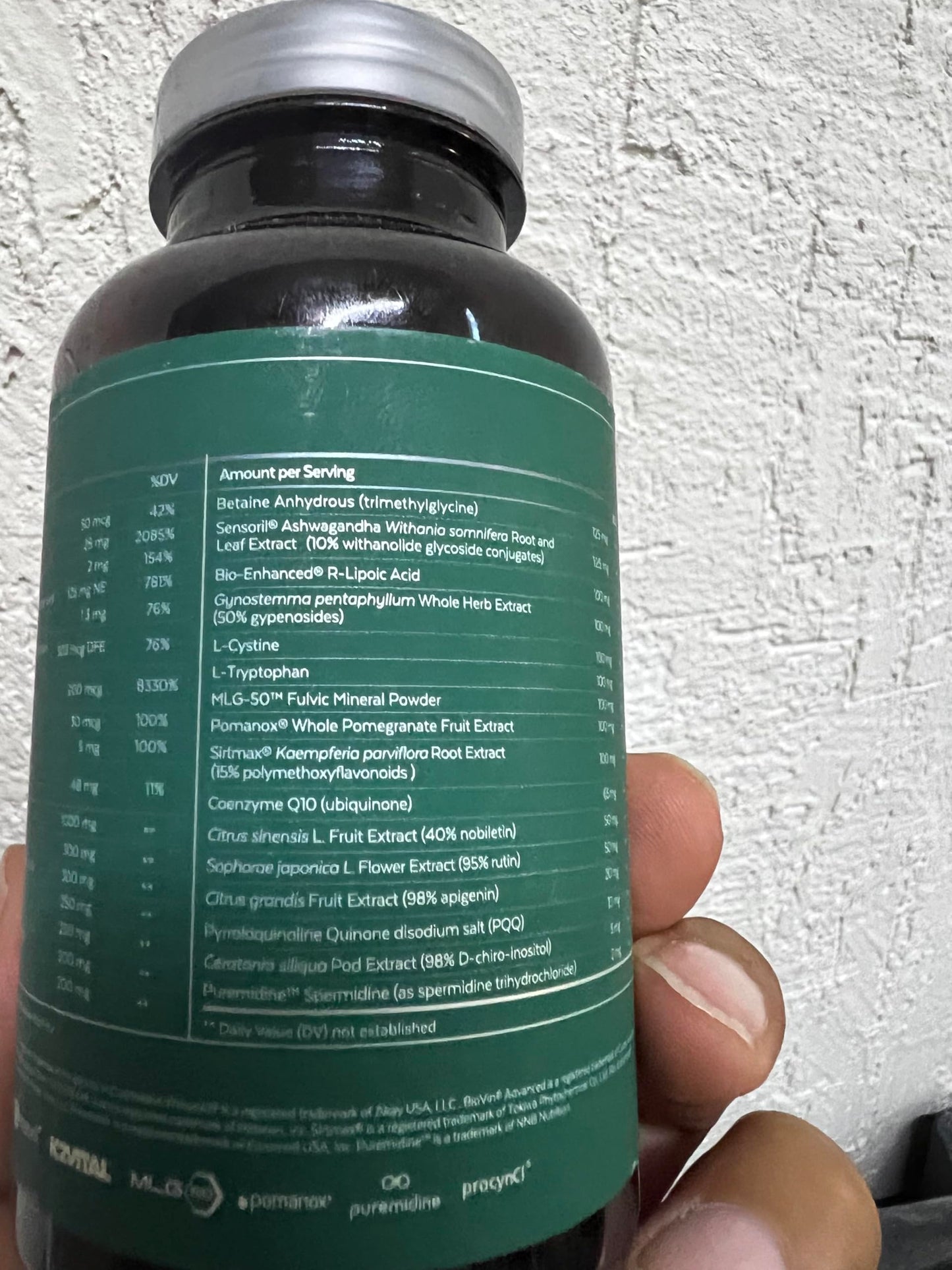 Botella y caja Qualia Life y Senolytic NEUROHACKER COLLECTIVE