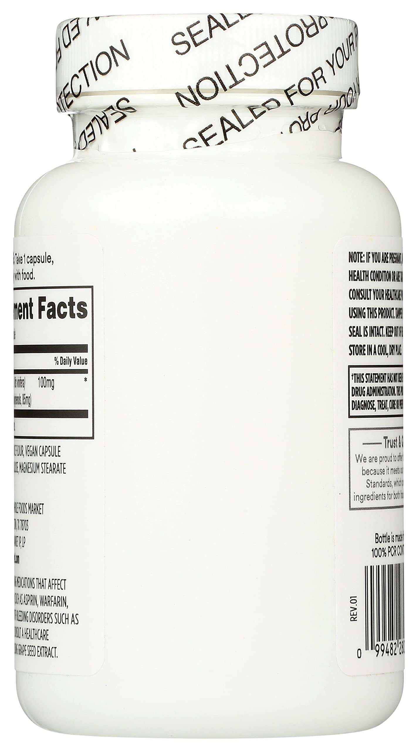 Botella de extracto de semilla de uva con precinto de seguridad.