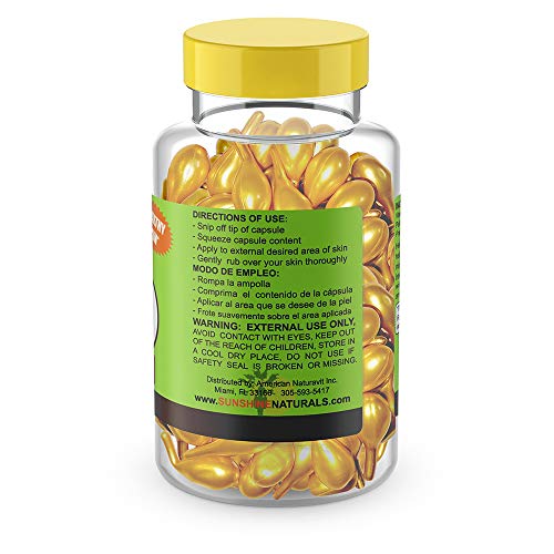 Pila de cajas del hidratante Sunshine Naturals vitamina E y aloe vera