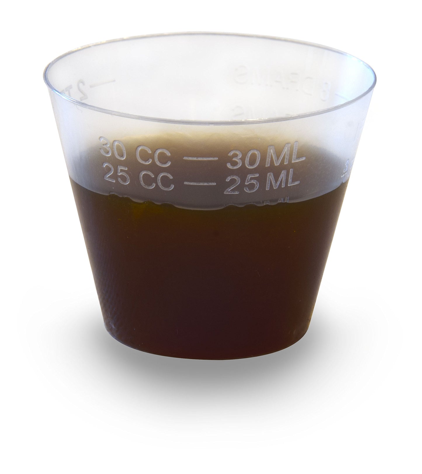 Suplemento líquido Vivioptal Kids en vaso medidor