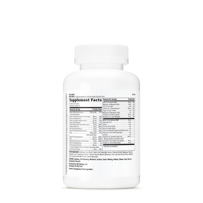 Botella de GNC Women's Active abierta con cápsulas a la vista.