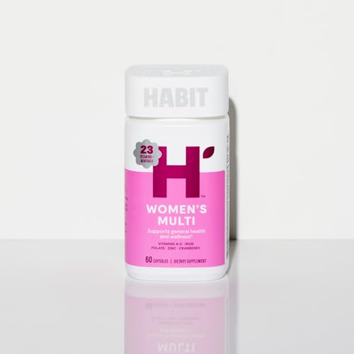 Botella del suplemento multivitamínico Habit bajo luz blanca.