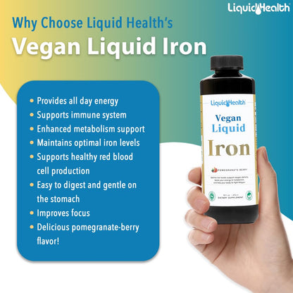 Botella grande de hierro líquido vegano Liquid Health en fondo de mano