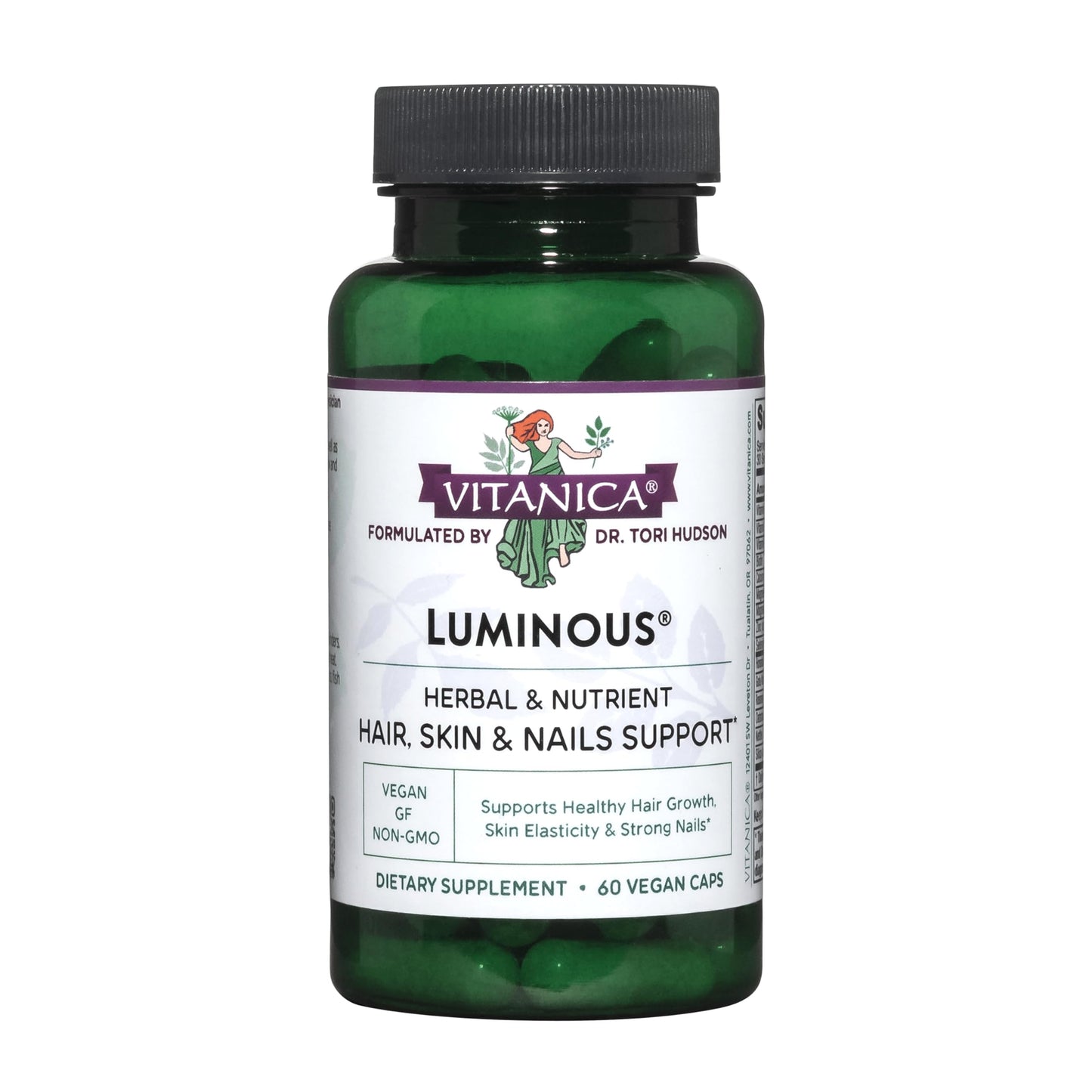 botella verde de luminarias vitaminas veganas
