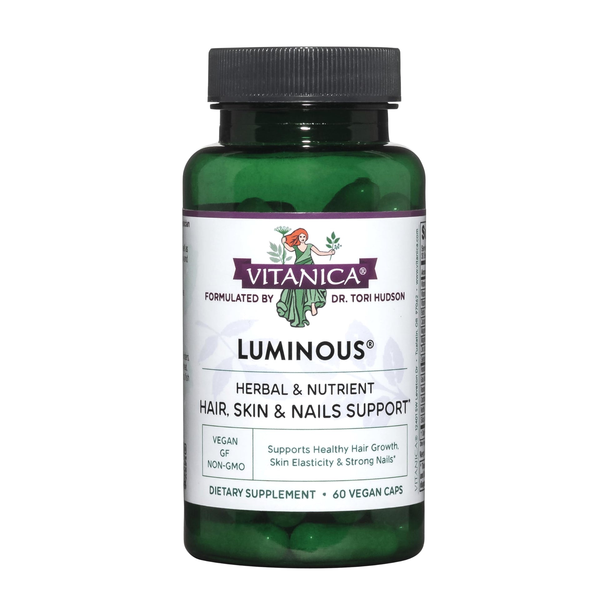 botella verde de luminarias vitaminas veganas