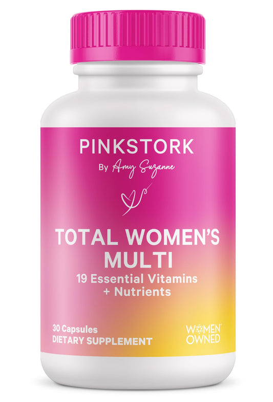 Botella de multivitamínico Pink Stork para la salud femenina