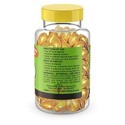 Pila de cajas del hidratante Sunshine Naturals vitamina E y aloe vera