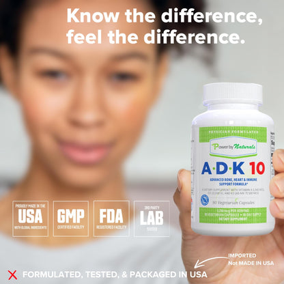 Cápsula de vitamina ADK 10 Power By Naturals aislada