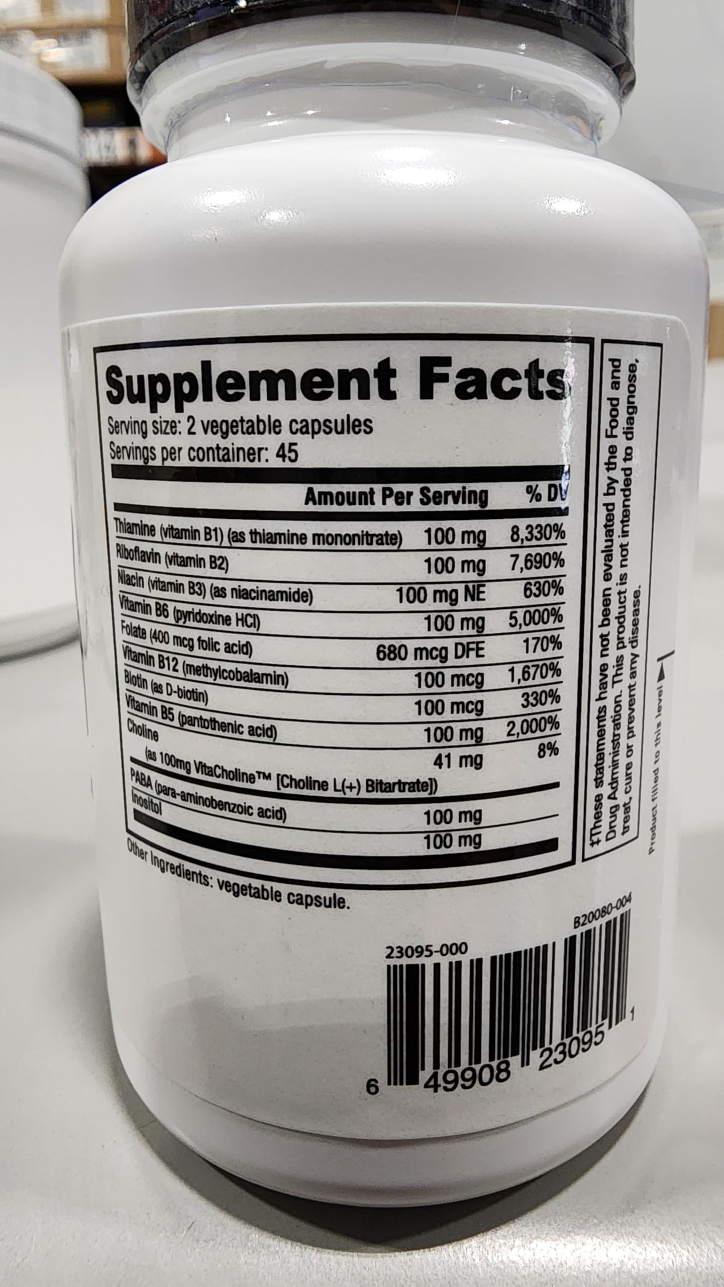 Etiqueta NutraBio suplemento vitamina B-100 y magnesio