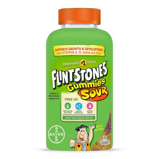 Botella de vitaminas Flintstones con tapa naranja y sabores agridulces.