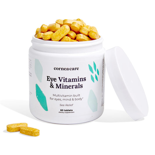 Frasco blanco con tabletas amarillas de multivitamina para ojos