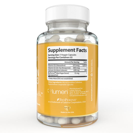 Frasco con cápsulas Lumen Naturals K2D3 para salud femenina