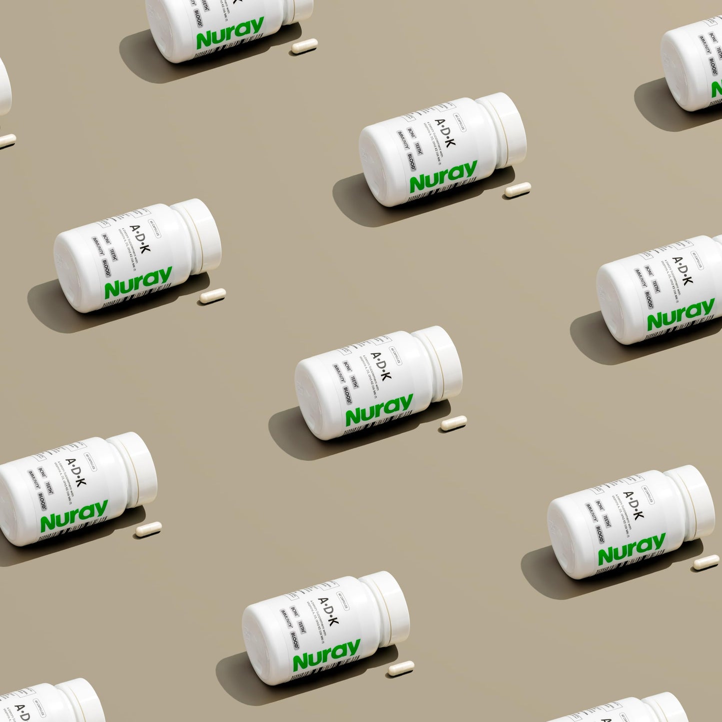 Frente paquete suplemento Nuray ADK con vitaminas esenciales