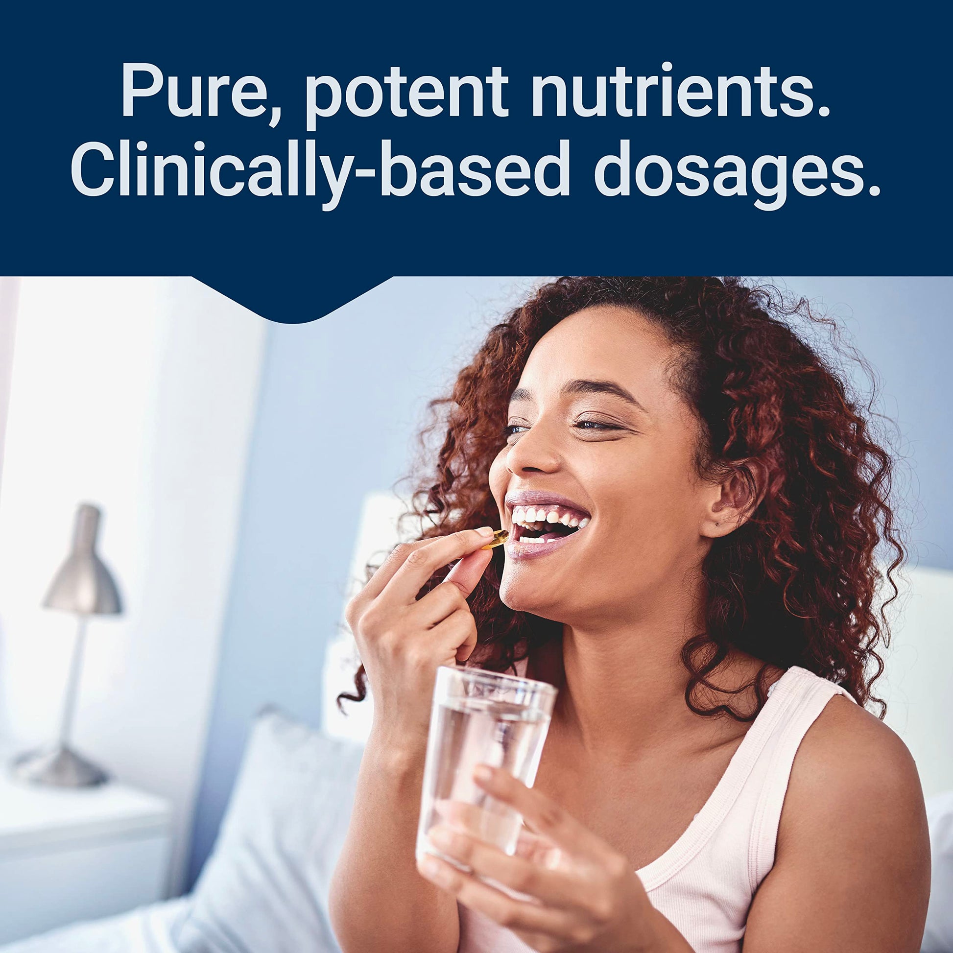 Mujer tomando cápsula de multivitamínico, vida saludable.