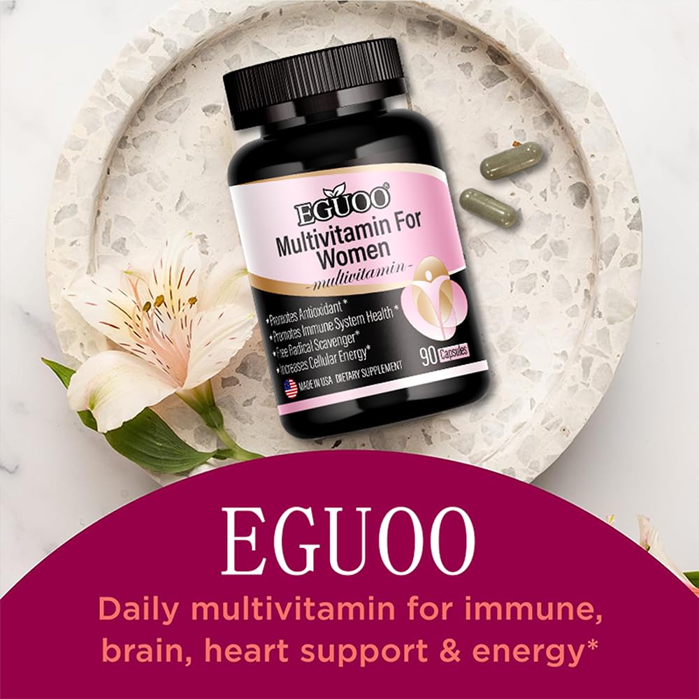 Multivitaminas EGUOO en mesa con flor