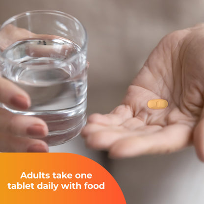 Tableta de multivitaminas One A Day con agua