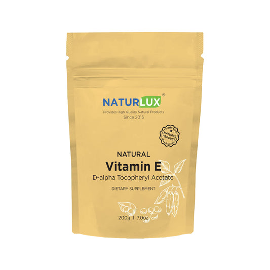 Frasco de Vitamina E Naturlux D-Alpha acetato caja blanca