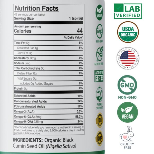 Botella de vidrio con aceite de semilla negra