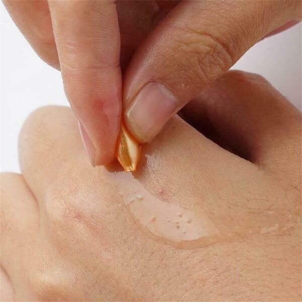 Detalle cápsulas de vitamina E marca ZZLLH para arrugas