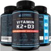 Frasco de suplemento Vitamina K2 D3 Cosmic Wellness 5000 UI