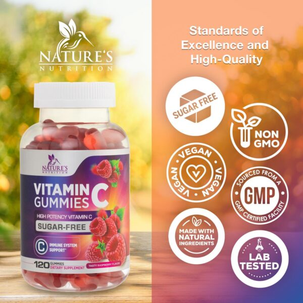 Gominolas vitamina c sin azúcar frambuesa en mano