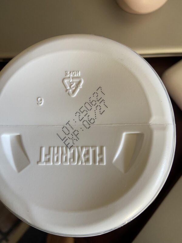 Cucharita de medición y polvo