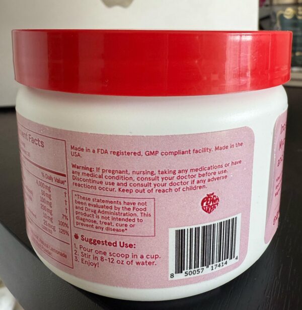 Frasco mostrado de lado con etiqueta