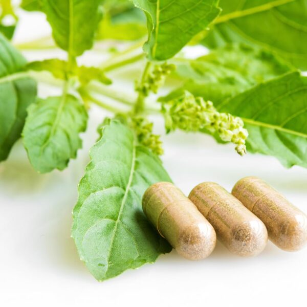 Cápsulas de carbonato de calcio junto al envase lateral