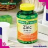 Botella y paquete del Zinc con vitamina D