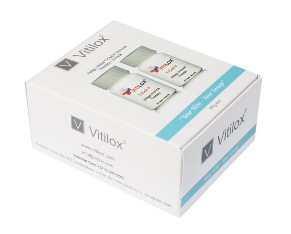 Version 1.0.0 Vitilox Vitiligo cápsula vista superior en mano