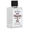 Botella aceite vitamina E Cococare textura sedosa 0.5 oz