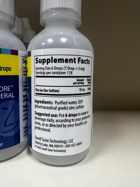 Version 1.0.0 Agua con gotas del suplemento líquido de zinc Taste N' Score