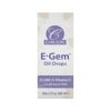 Aplicación gotas aceite vitamina E Carlson en piel