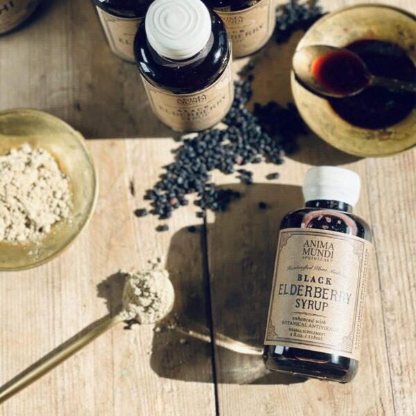 Frasco de jarabe con hongos medicinales Anima Mundi