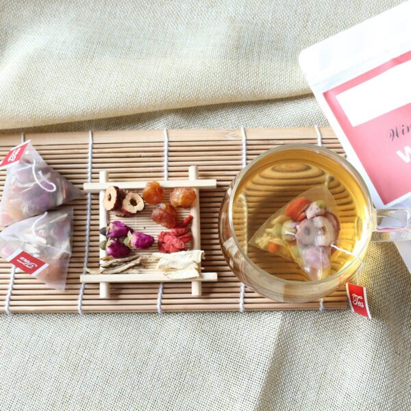 Producto Wins Town Womb para salud femenina caja y bolsas