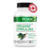 Renew Actives Spirulina cápsulas en superficie blanca