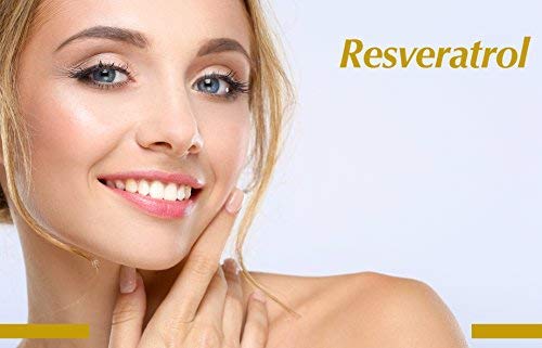 Close up cápsulas rojas de Resveratrol