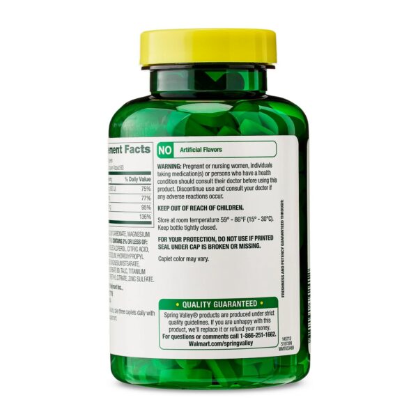 Version 1.0.0 Tres comprimidos recubiertos junto a una taza